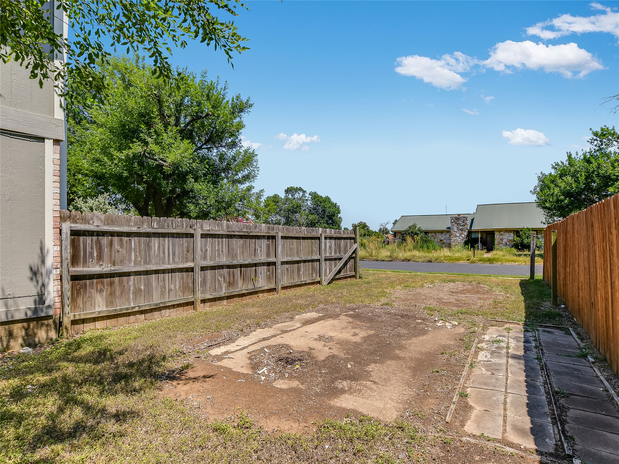 300 North Field Street Round Rock, TX 78681 - Photo 24 of 26 Large parking area on the side yard for work truck, boat, trailer or RV.