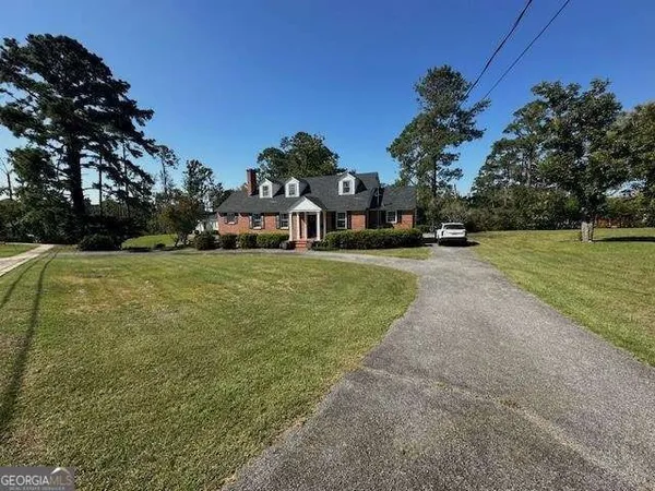 a view of a street with houses