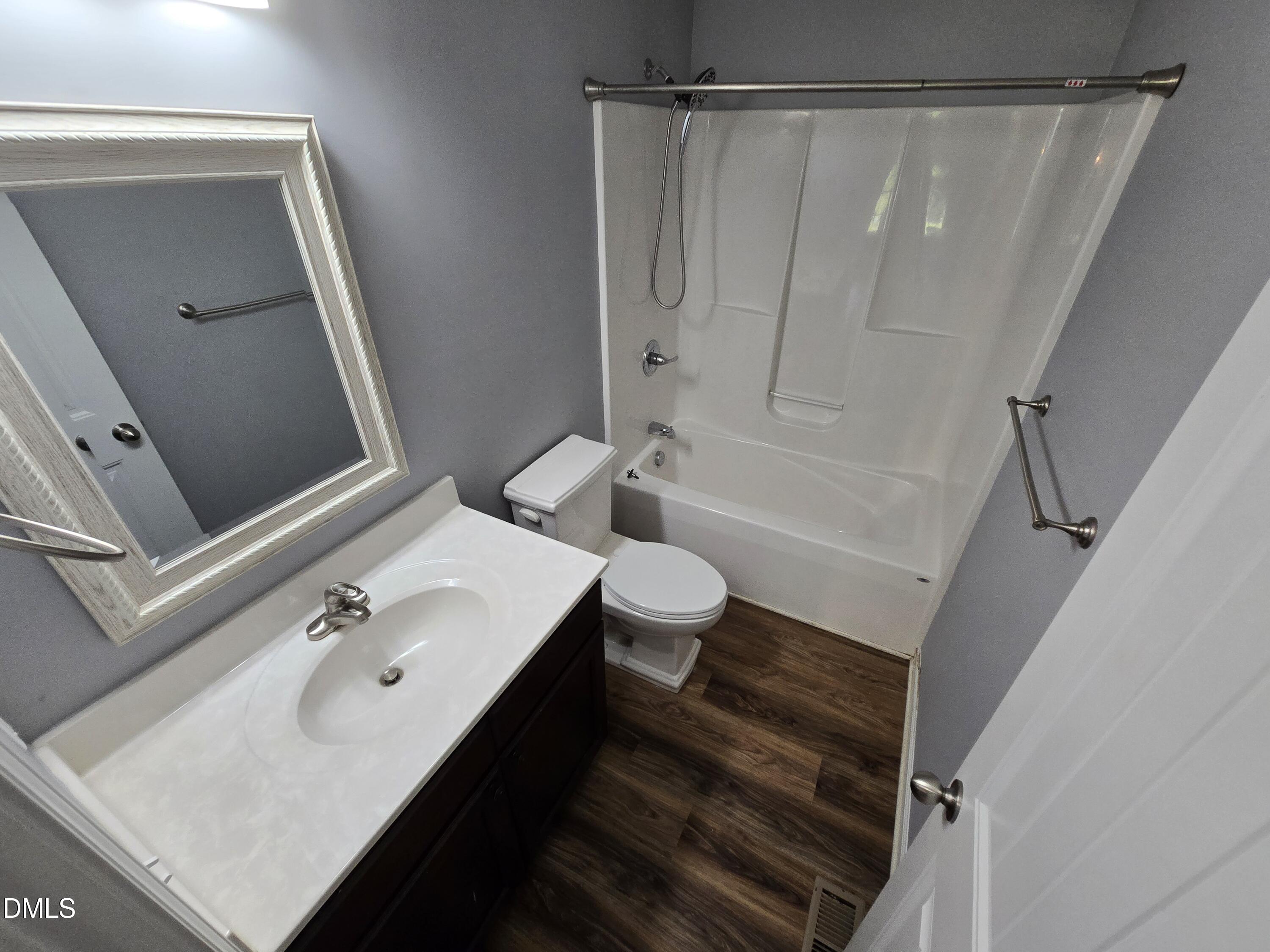 1180 Lambert Chapel Road Siler City, NC 27344 - Photo 25 of 42 a bathroom with a sink and a mirror