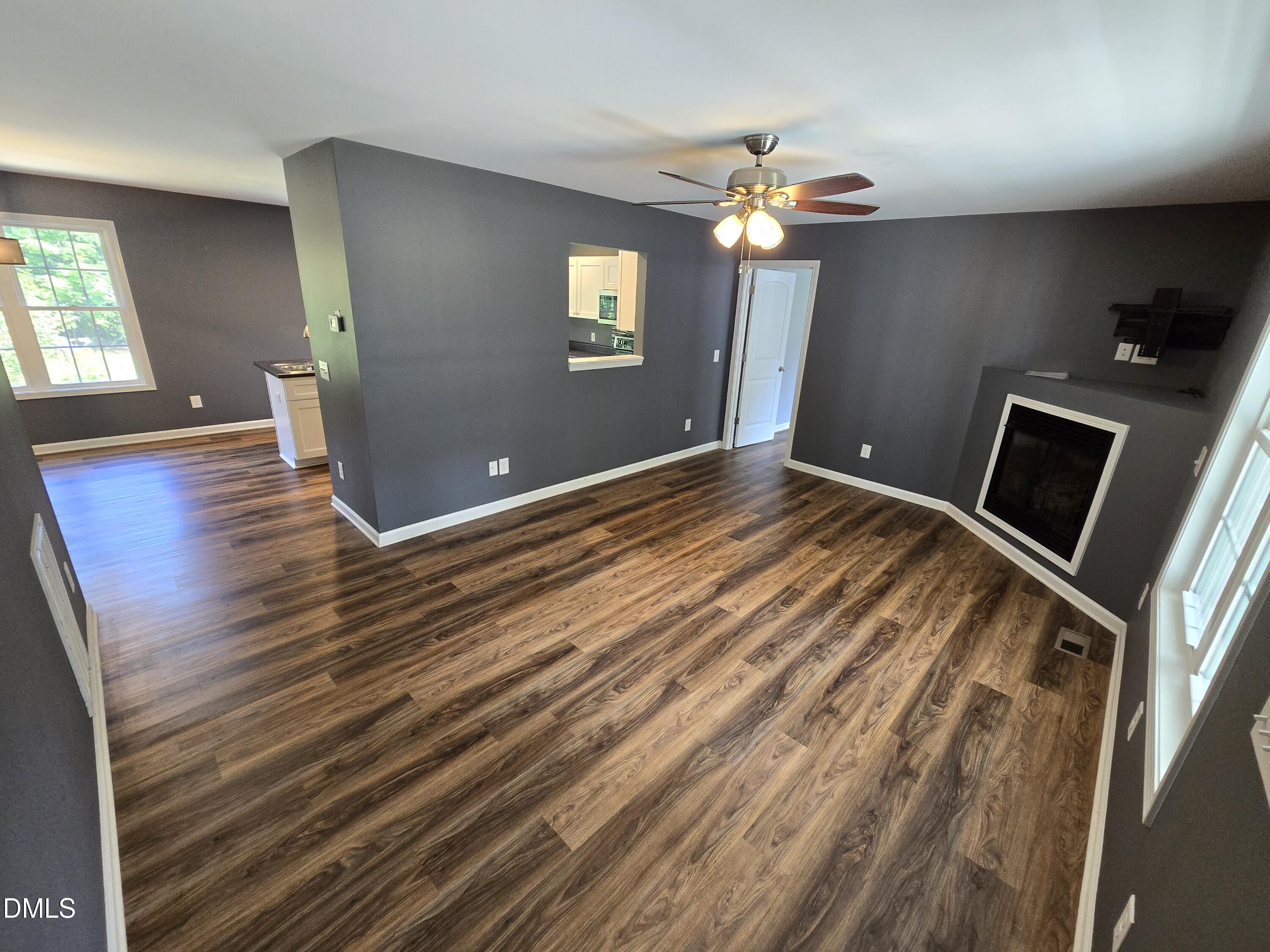 1180 Lambert Chapel Road Siler City, NC 27344 - Photo 36 of 42 a view of empty room with wooden floor