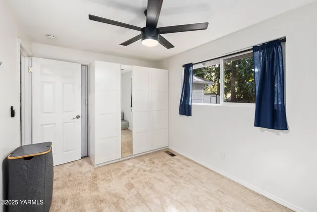 a room with furniture and a window