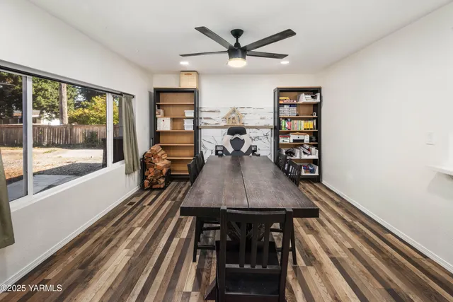 a view of a dining room with furniture