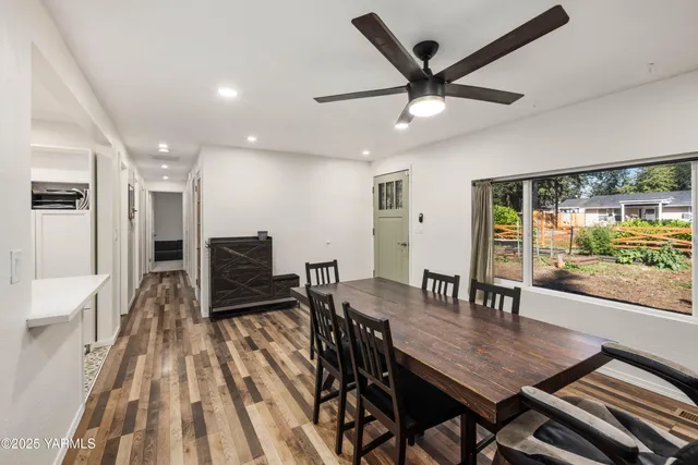 a view of a dining room with furniture