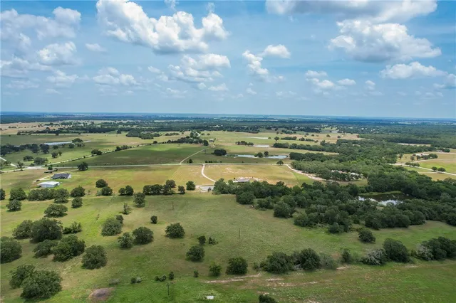 a view of a lake and a yard
