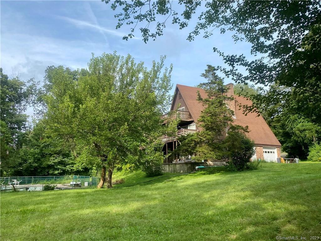23 R Carriage Drive Durham, CT 06422 - Photo 1 of 1 a view of a trees with a yard