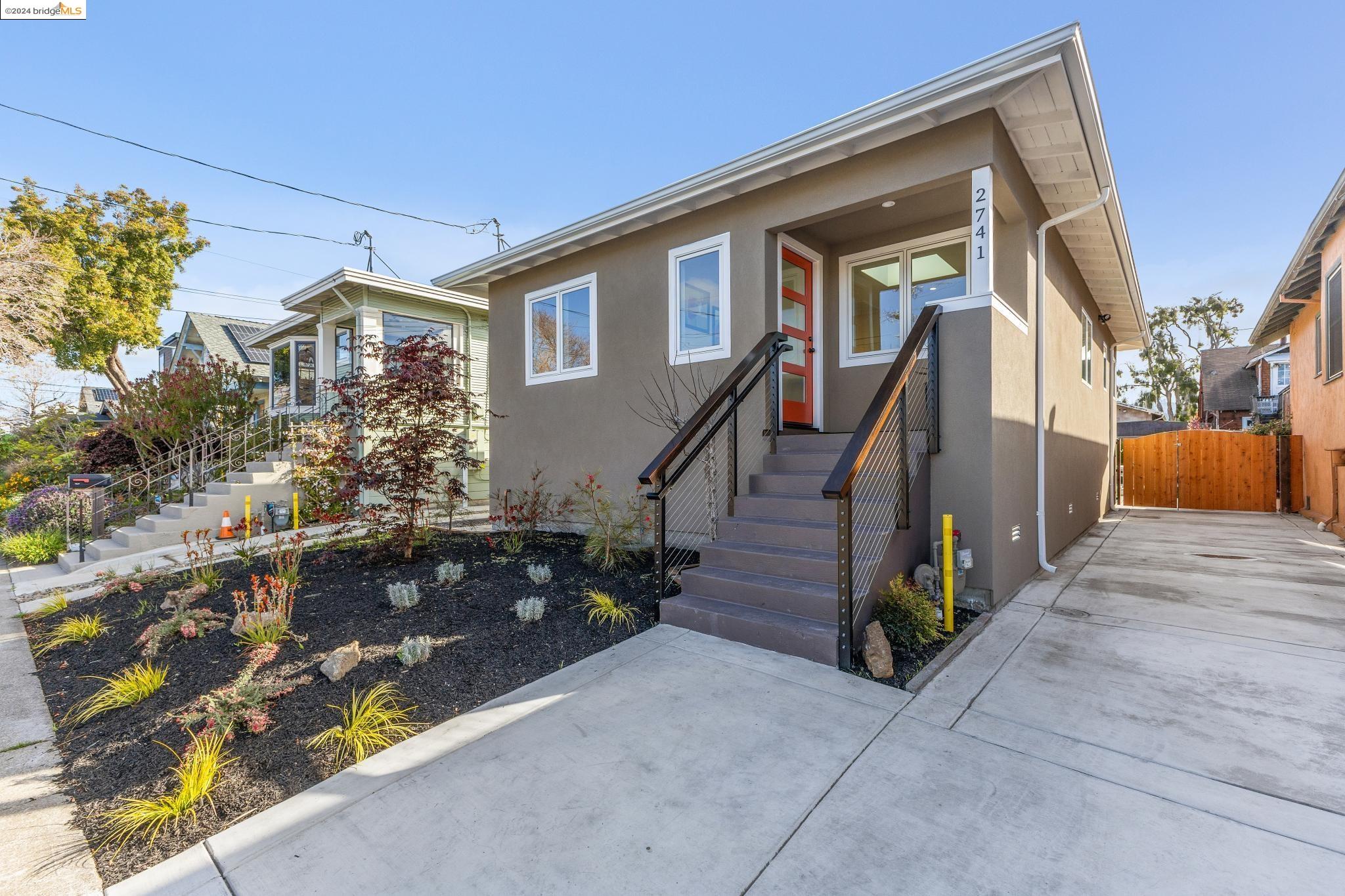 2741 Mathews Street Berkeley, CA 94702 - Photo 1 of 1 a front view of a house with stairs