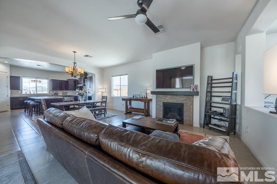 30 Phaethon Court Reno, NV 89521 - Photo 11 of 39 a living room with furniture and a fireplace