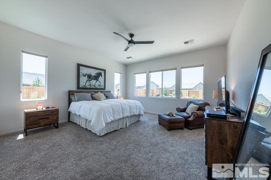 30 Phaethon Court Reno, NV 89521 - Photo 14 of 39 a bed room with a bed and a window
