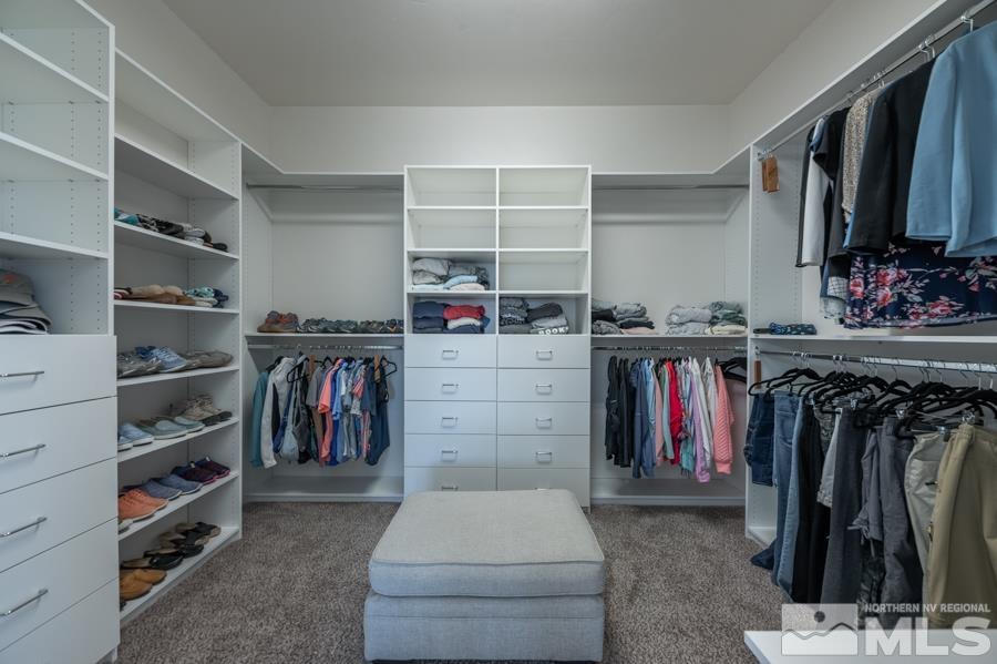 30 Phaethon Court Reno, NV 89521 - Photo 18 of 39 a view of walk in closet with clothes and shoes