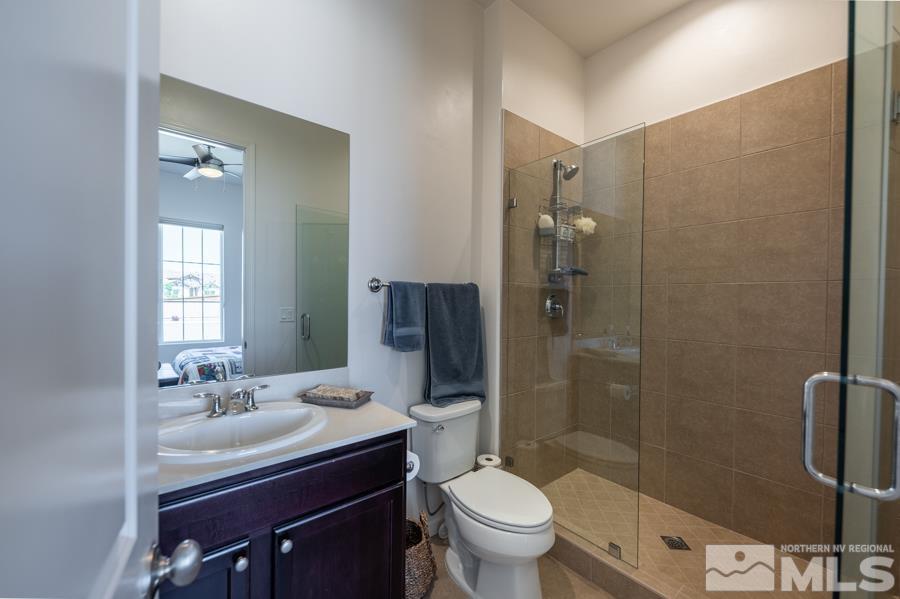 30 Phaethon Court Reno, NV 89521 - Photo 20 of 39 a bathroom with a sink toilet and shower
