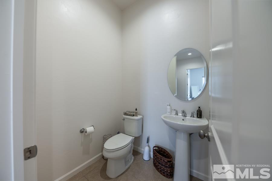 30 Phaethon Court Reno, NV 89521 - Photo 22 of 39 a bathroom with a toilet sink and mirror