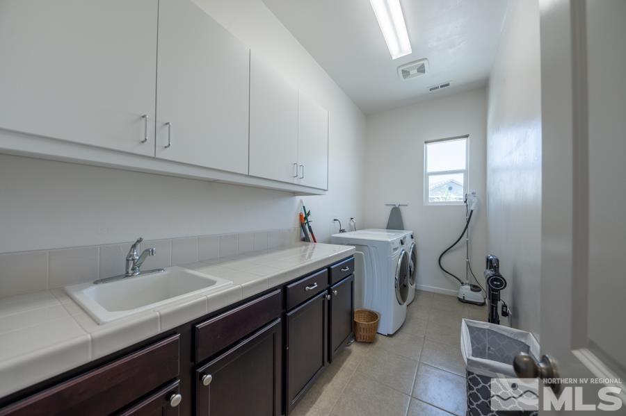 30 Phaethon Court Reno, NV 89521 - Photo 23 of 39 a view of a sink and cabinets