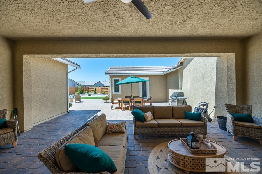 30 Phaethon Court Reno, NV 89521 - Photo 27 of 39 a living room with furniture and a large window