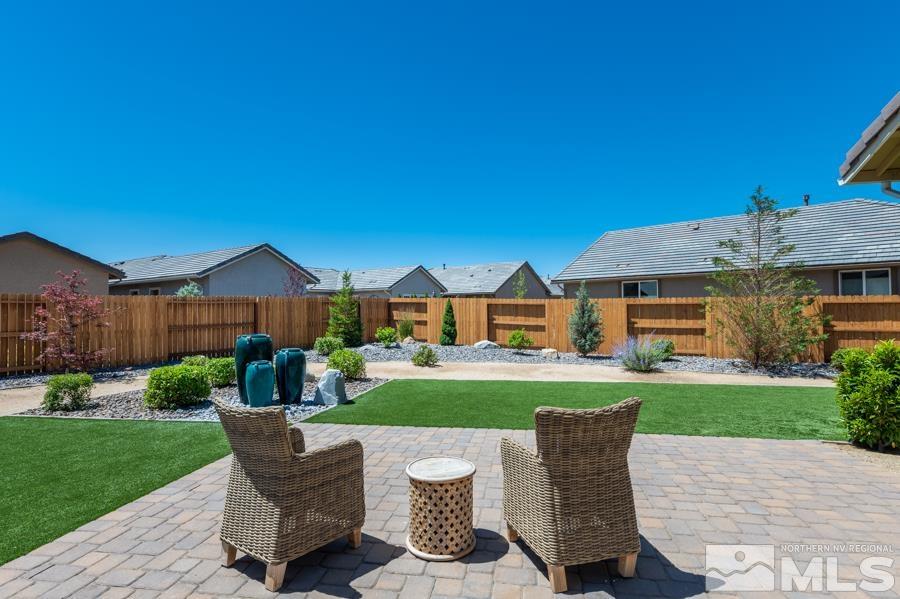 30 Phaethon Court Reno, NV 89521 - Photo 28 of 39 a view of a chairs in backyard of house