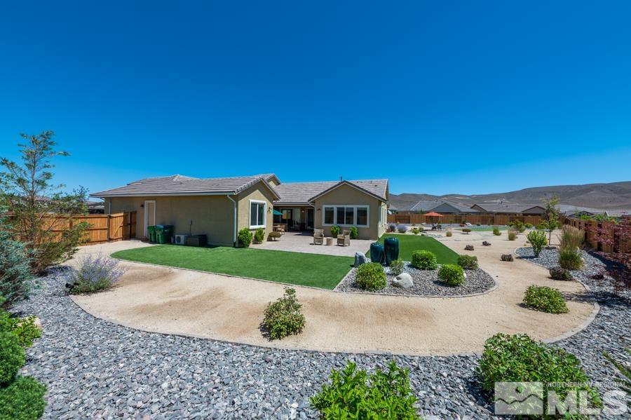 30 Phaethon Court Reno, NV 89521 - Photo 29 of 39 a front view of a house with a yard