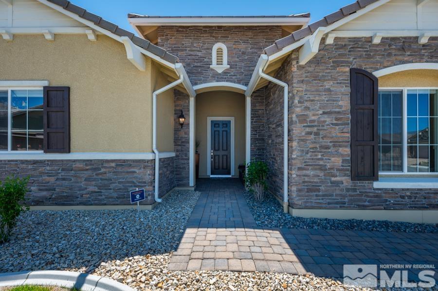 30 Phaethon Court Reno, NV 89521 - Photo 5 of 39 a front view of a house with a yard