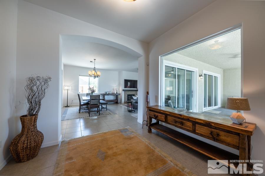 30 Phaethon Court Reno, NV 89521 - Photo 6 of 39 a room with furniture pool table flat screen tv and windows