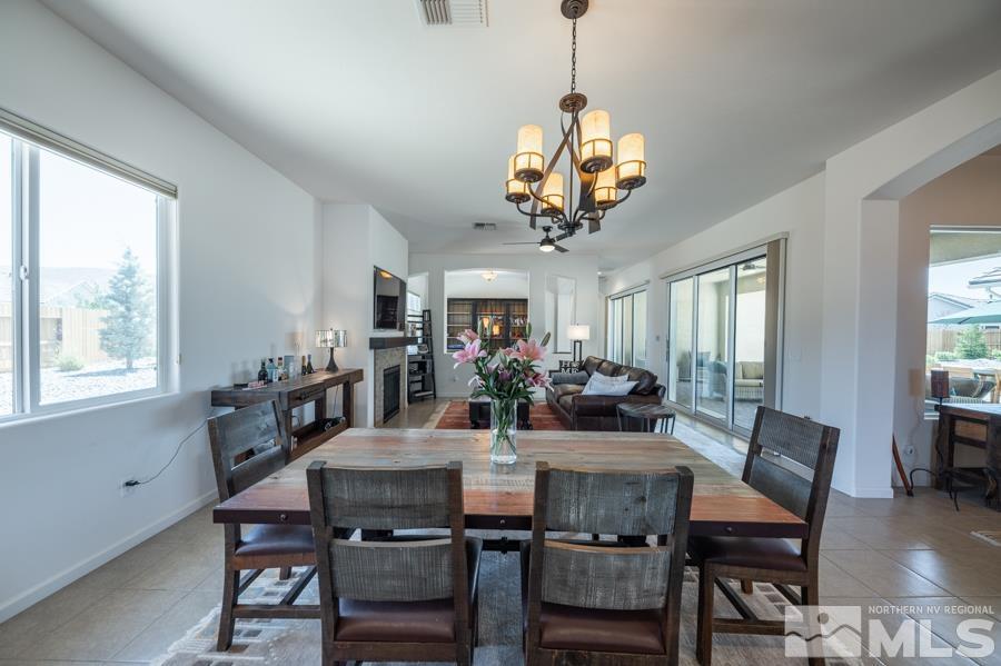 30 Phaethon Court Reno, NV 89521 - Photo 9 of 39 a view of a dining room with furniture window and outside view