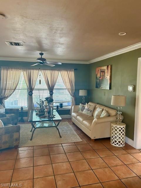 4201 19th Place Southwest Naples, FL 34116 - Photo 3 of 12 a living room with furniture and a floor to ceiling window