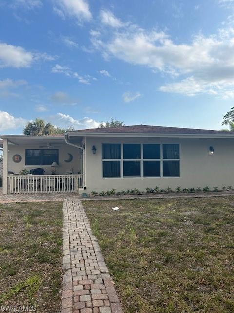 4201 19th Place Southwest Naples, FL 34116 - Photo 5 of 12 front view of a house