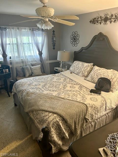 4201 19th Place Southwest Naples, FL 34116 - Photo 8 of 12 a bedroom with a bed and a window