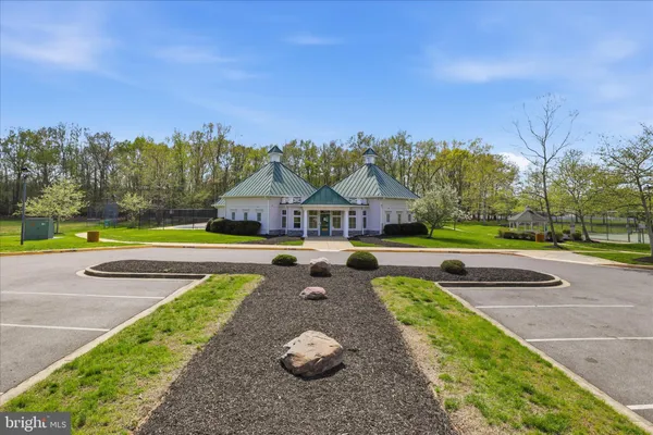 a view of a swimming pool with a backyard