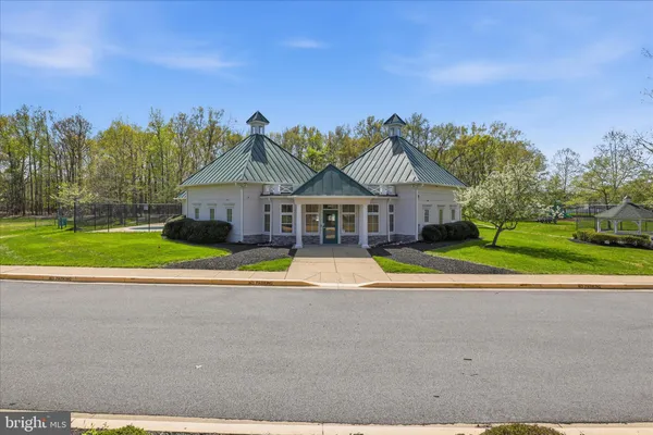 a view of a golf course with a lake