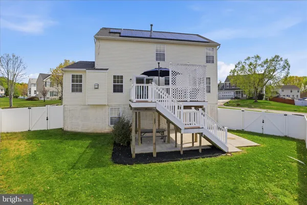 a outdoor space with patio the couches and a potted plant