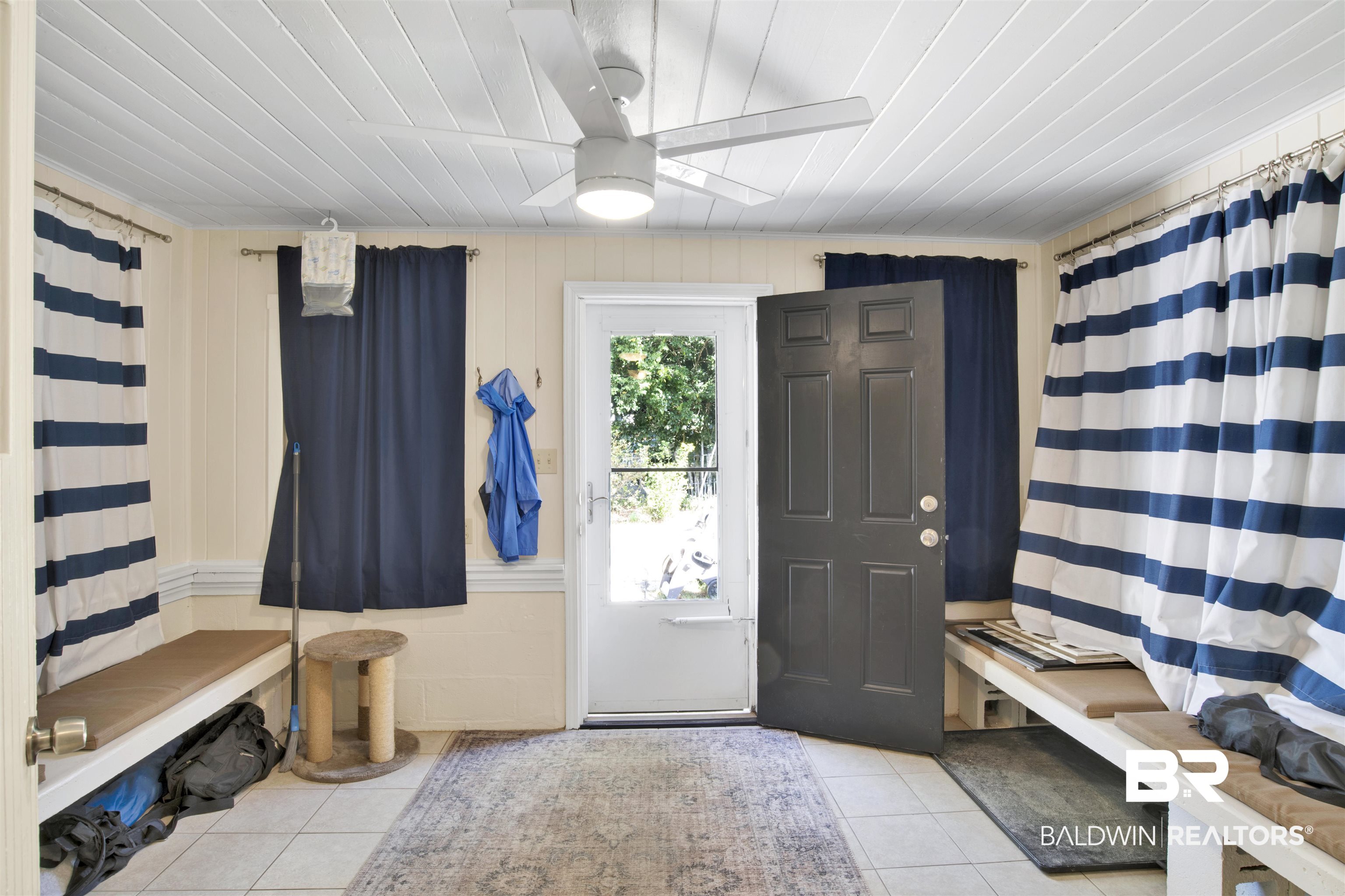 605 Van Avenue Daphne, AL 36526 - Photo 26 of 37 Mudroom with wood walls, ceiling fan, wooden ceiling, and light tile patterned floors