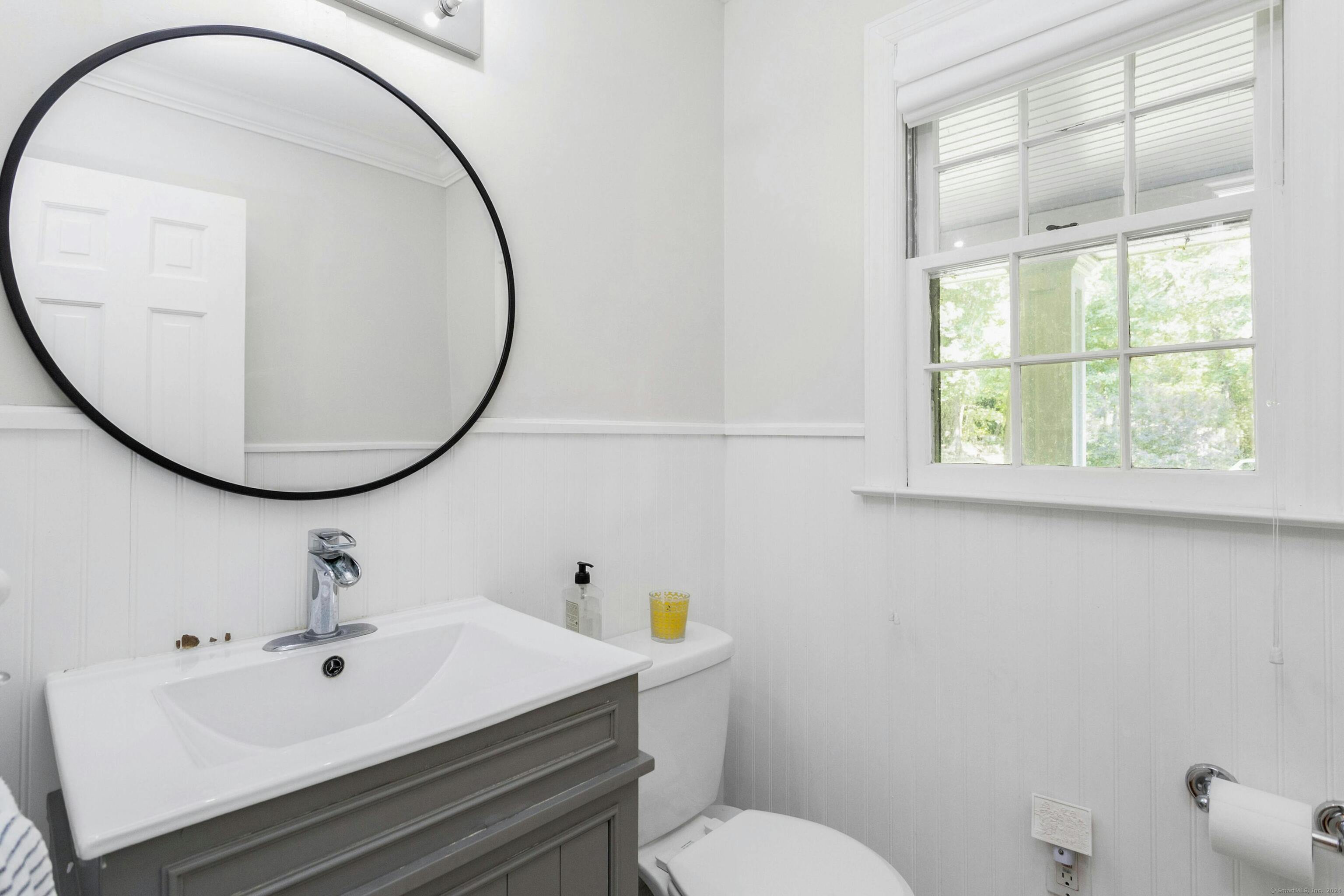 21 Roxbury Lane Wilton, CT 06897 - Photo 16 of 37 The first floor powder room.