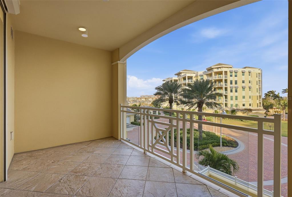 800 Collany Road, Unit 302 St. Petersburg, FL 33715 - Photo 40 of 66 a view of a balcony with chairs