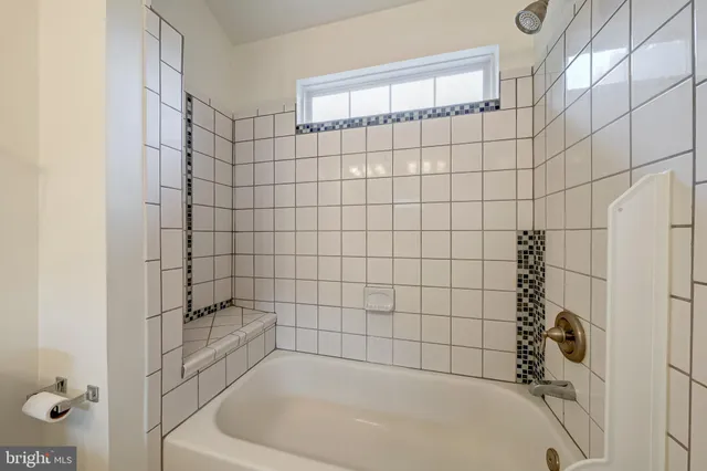 a bathroom with a bathtub