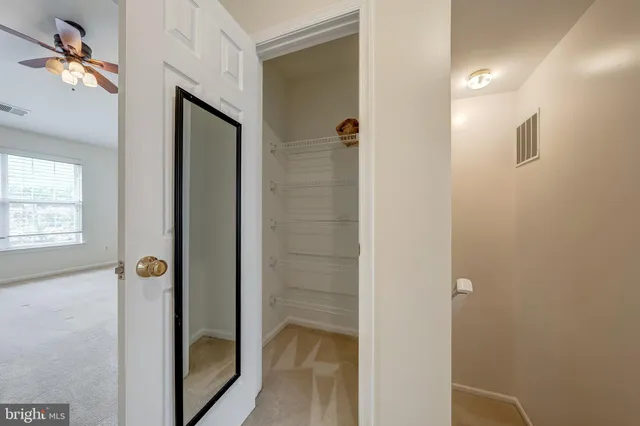 a bathroom with a mirror