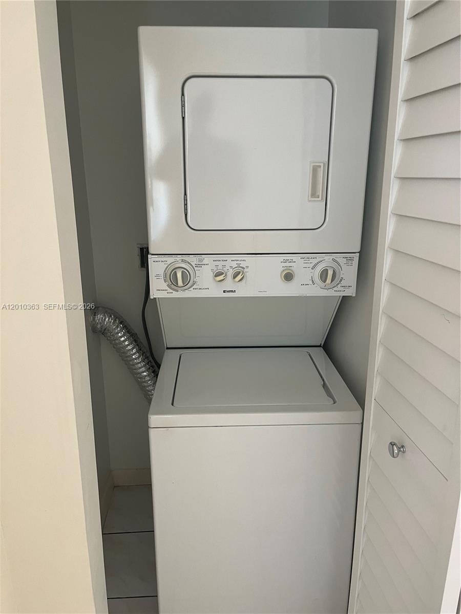 1419 Southwest 22nd Avenue, Unit 4 Miami, FL 33145 - Photo 11 of 11 a close up view of washer and dryer