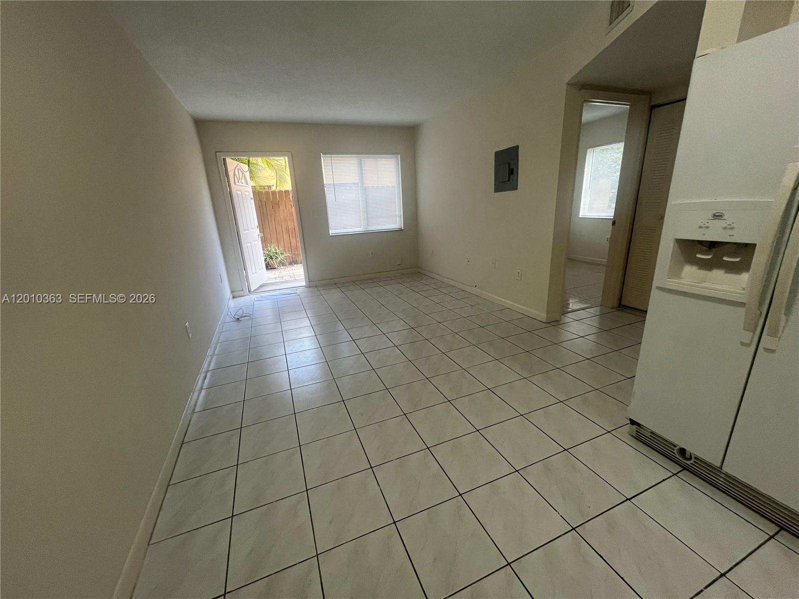 1419 Southwest 22nd Avenue, Unit 4 Miami, FL 33145 - Photo 5 of 11 a view of an empty room and a window