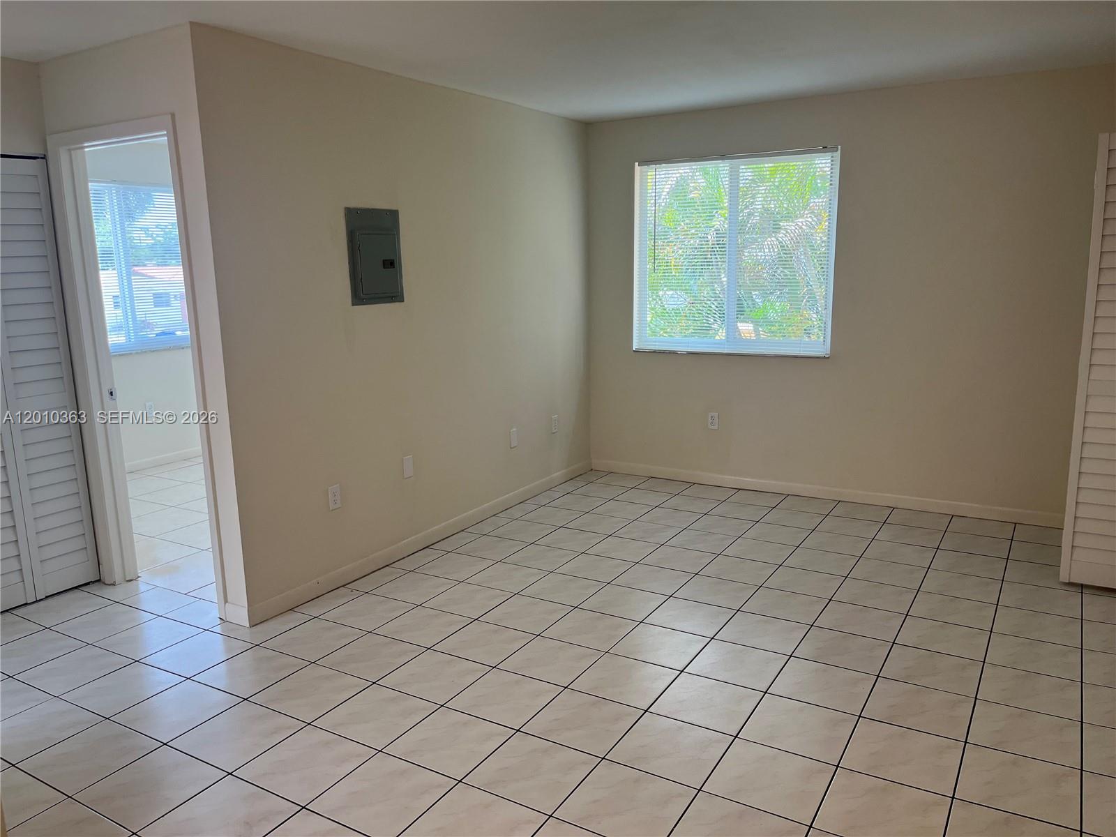 1419 Southwest 22nd Avenue, Unit 4 Miami, FL 33145 - Photo 10 of 11 an empty room with windows