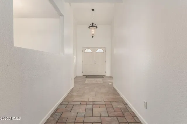 a view of empty room with a window