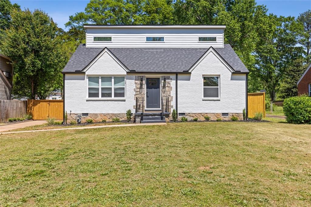 2032 McAfee Road Decatur, GA 30032 - Photo 1 of 1 a view of an house with backyard space and garden