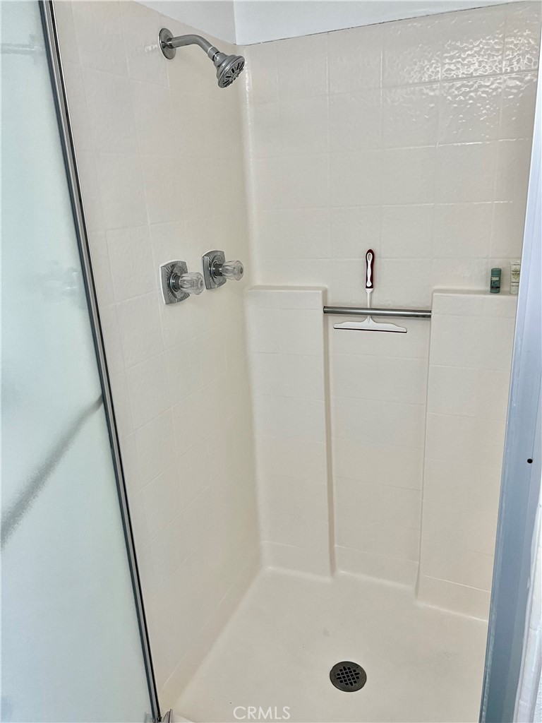 27857 Ruby, Unit 63 Mission Viejo, CA 92691 - Photo 23 of 23 a bathroom with a shower