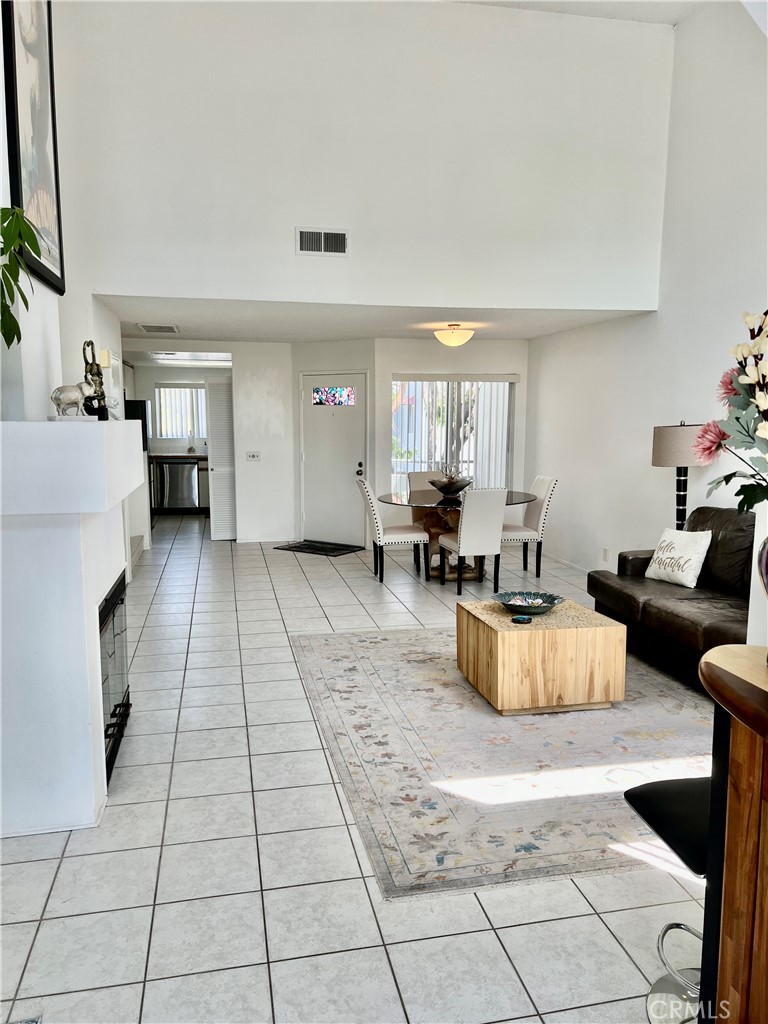 27857 Ruby, Unit 63 Mission Viejo, CA 92691 - Photo 3 of 23 a living room with furniture and a fireplace