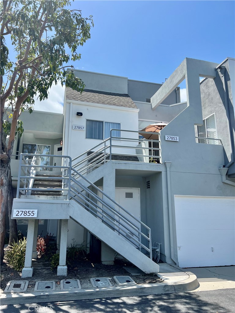 27857 Ruby, Unit 63 Mission Viejo, CA 92691 - Photo 4 of 23 a view of a house with a outdoor space