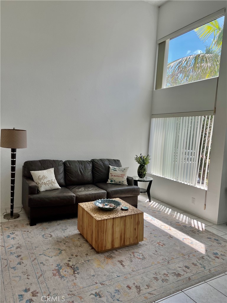 27857 Ruby, Unit 63 Mission Viejo, CA 92691 - Photo 6 of 23 a living room with furniture and a couch