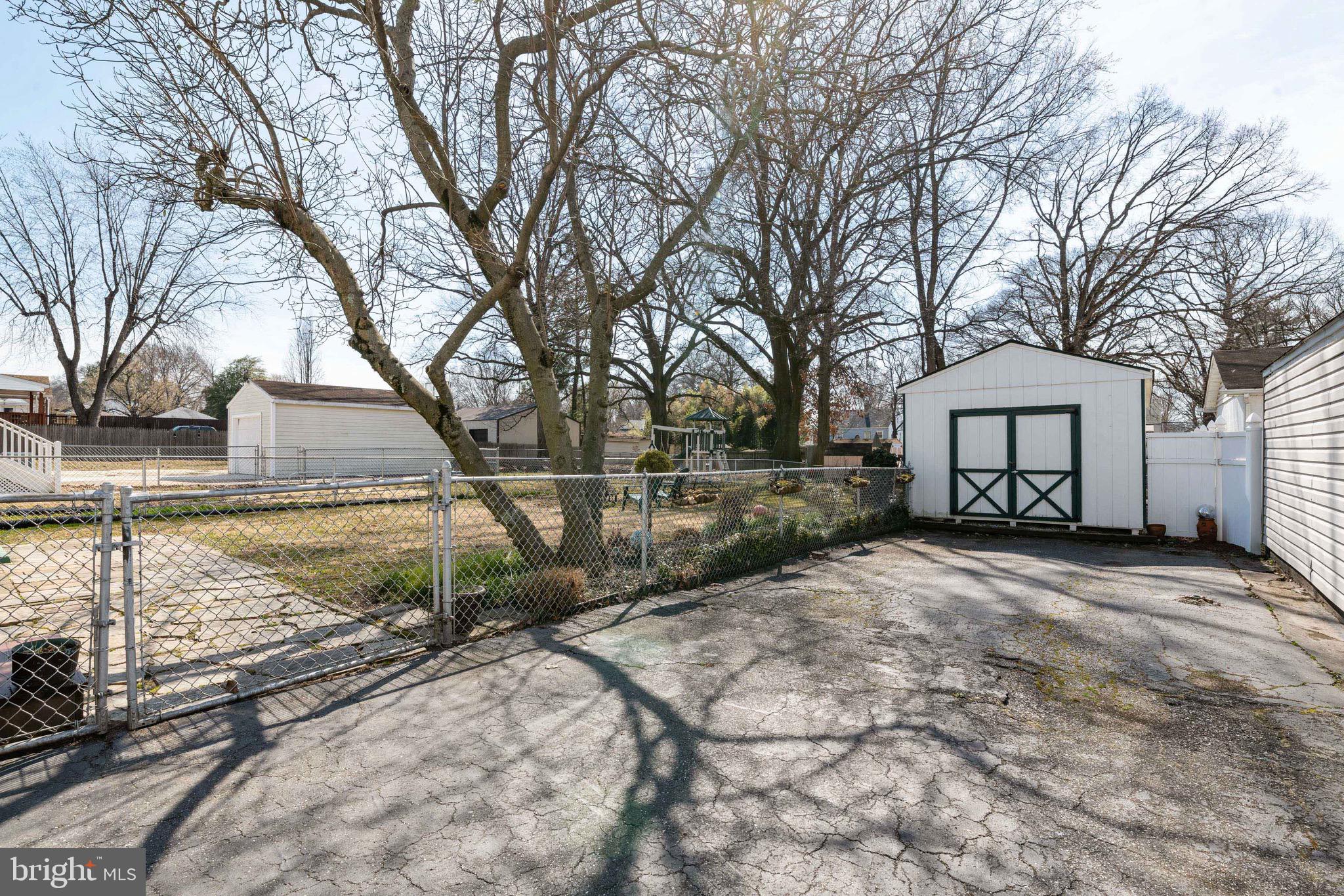 303 Townsend Road Baltimore, MD 21221 - Photo 14 of 24 Driveway and Shed