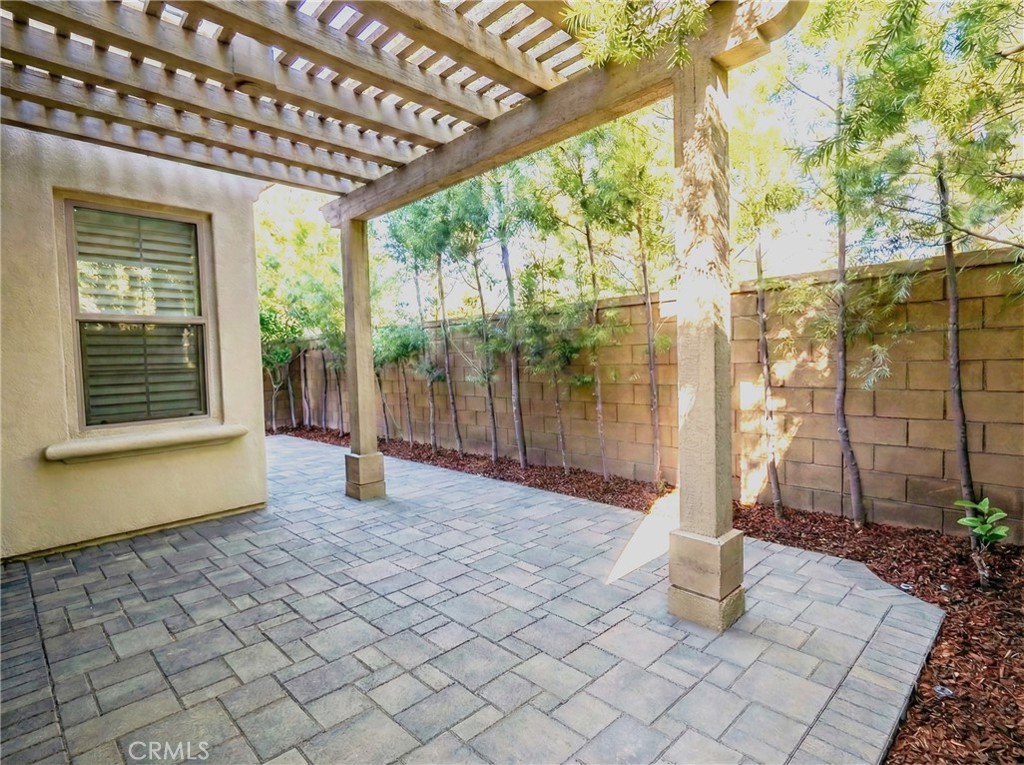 109 Sugar Cane Irvine, CA 92620 - Photo 16 of 26 a house with trees in front of it