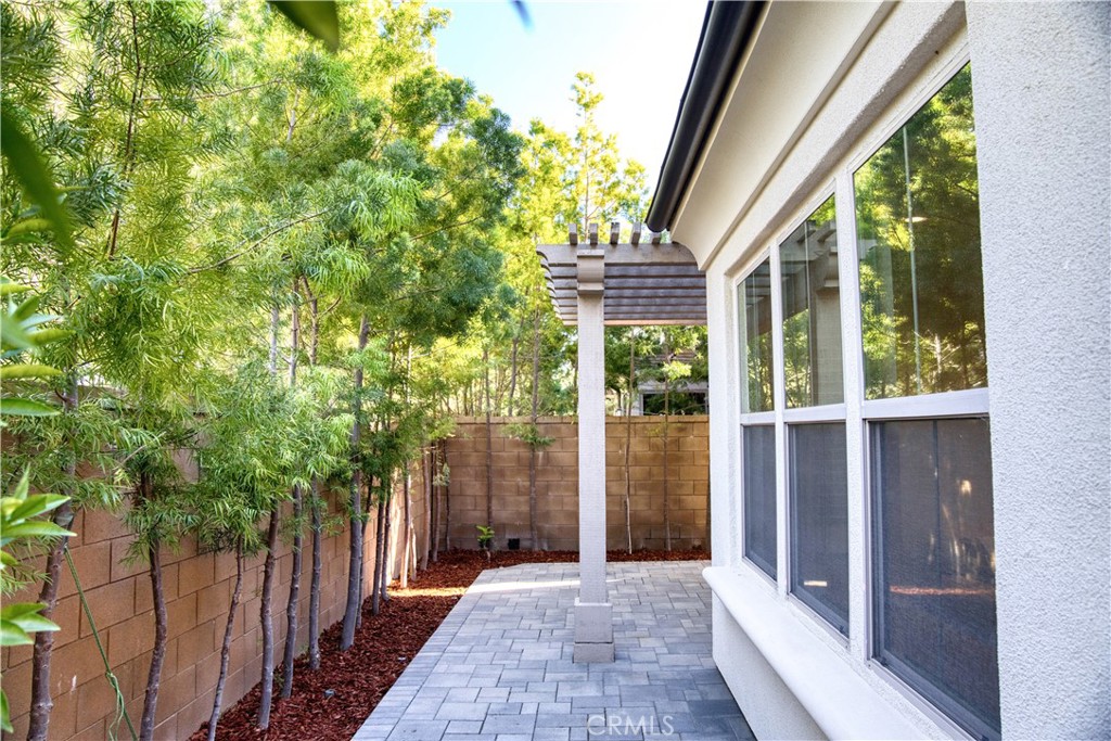 109 Sugar Cane Irvine, CA 92620 - Photo 17 of 26 a view of backyard with green space
