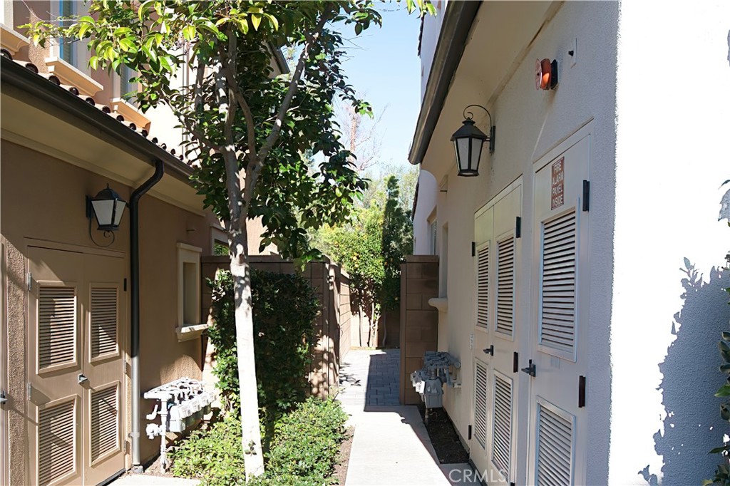 109 Sugar Cane Irvine, CA 92620 - Photo 19 of 26 a view of a house with a potted plant windows