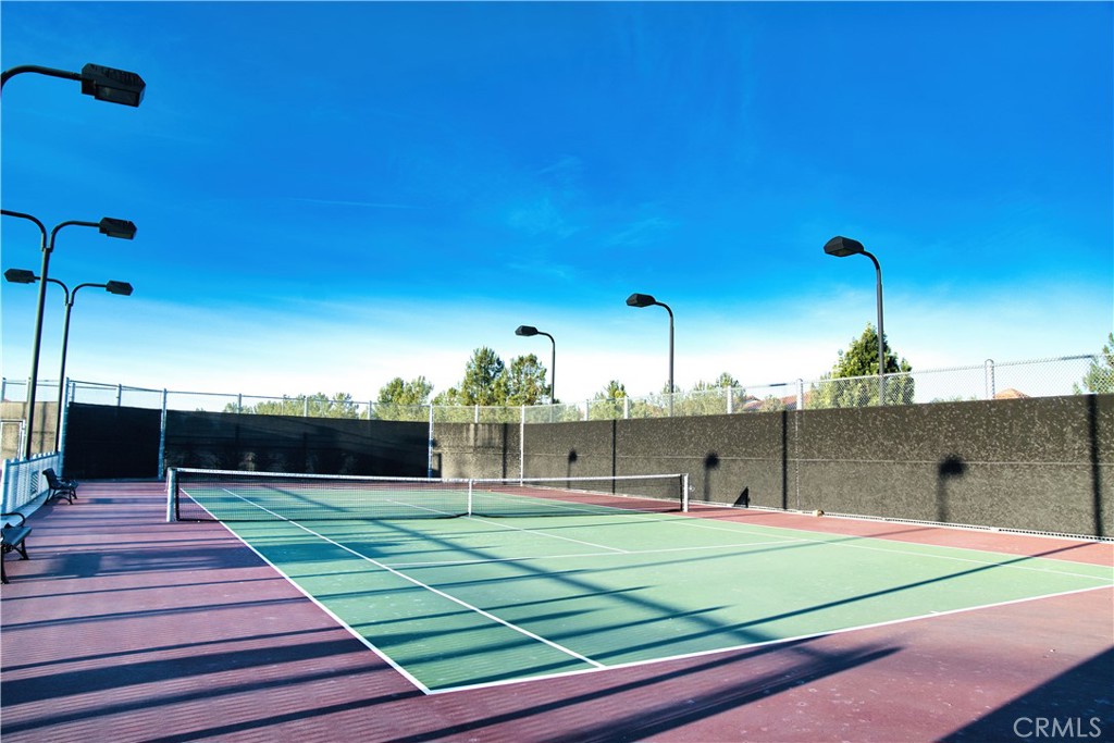 109 Sugar Cane Irvine, CA 92620 - Photo 24 of 26 a view of a tennis court