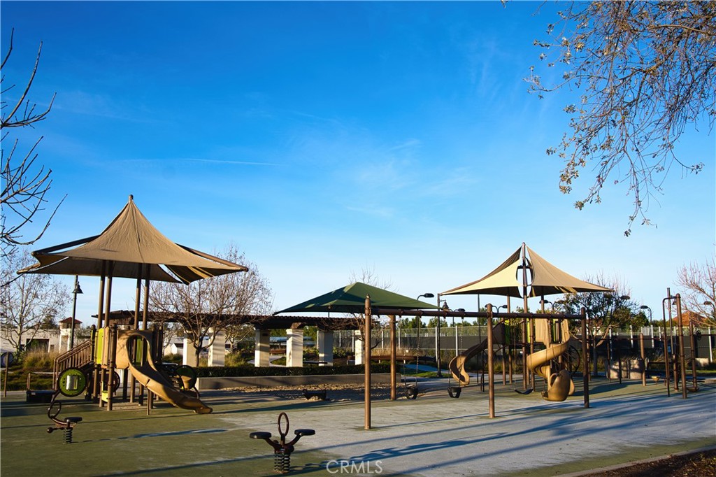 109 Sugar Cane Irvine, CA 92620 - Photo 25 of 26 an outdoor space with furniture and umbrella