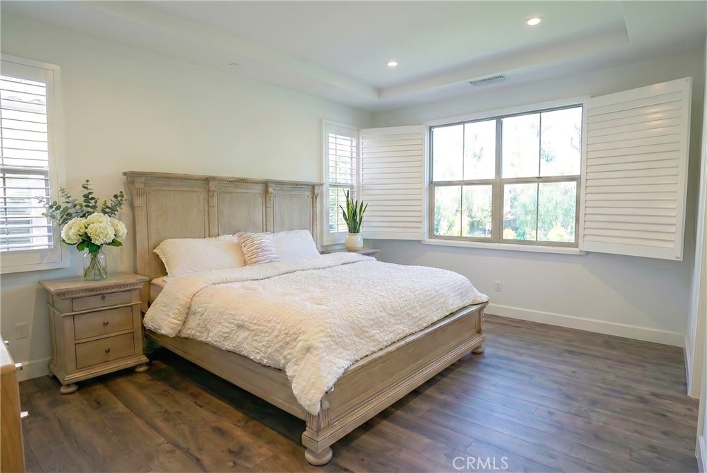 109 Sugar Cane Irvine, CA 92620 - Photo 10 of 26 a bedroom with a bed and window