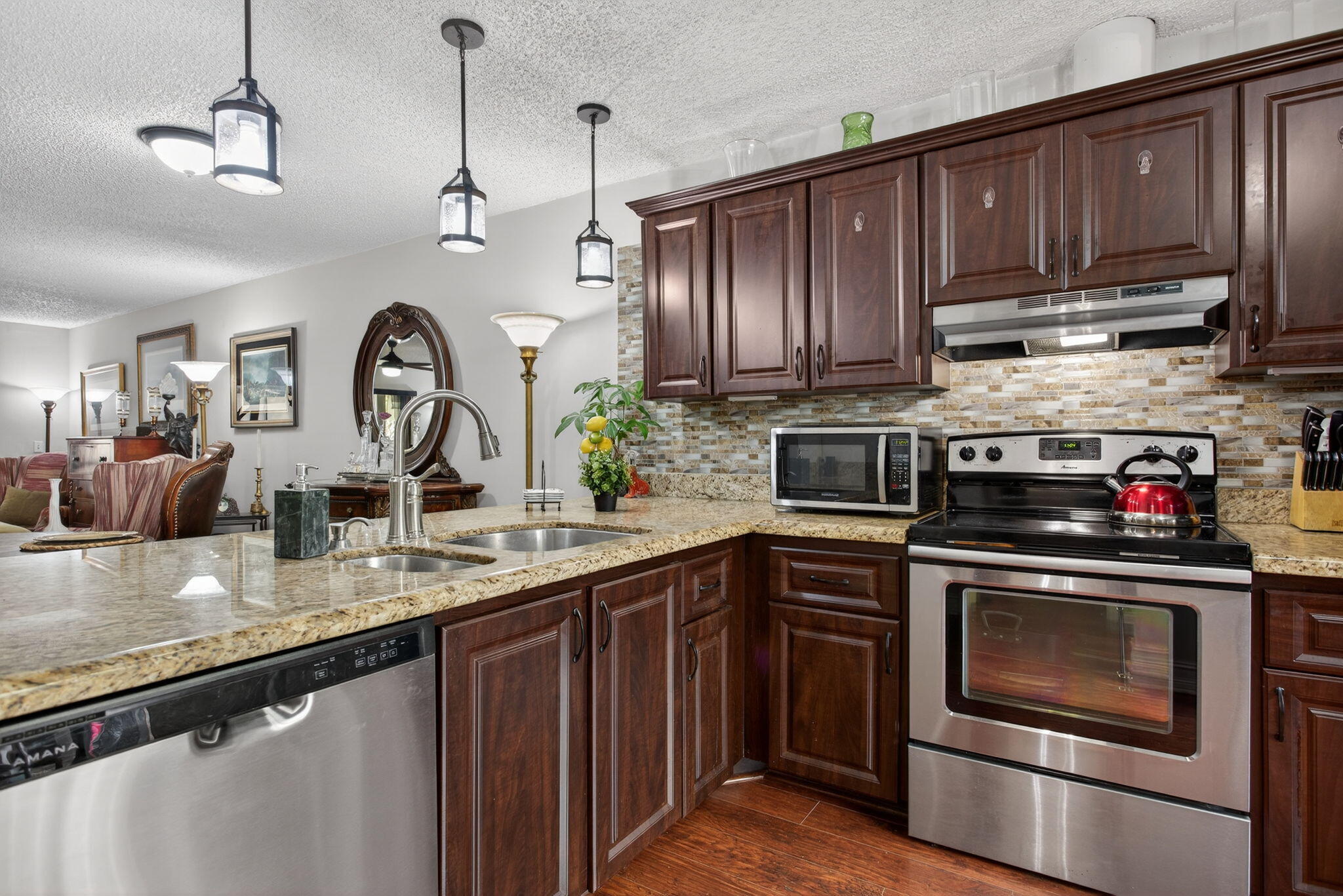 2122 Northeast 44th Street Lighthouse Point, FL 33064 - Photo 8 of 36 Open Kitchen to Dining and L/R